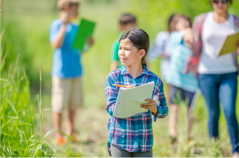 Children engage in an Eco-PBL lesson outside.