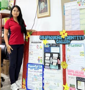 Jesse Calderón, a teacher at Unidad Educativa Stella Maris, shows off some creative student projects.