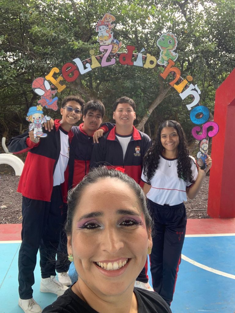 Lourdes Soledispa of Escuela Jacinto Gordillo on Isabela Island takes a selfie with her English students.